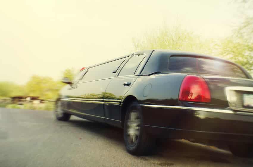 black limo speeding up